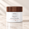 Treatments® - Embraced By - Pureness - Crema Purificante Día y Noche - 50 ml sobre mármol claro