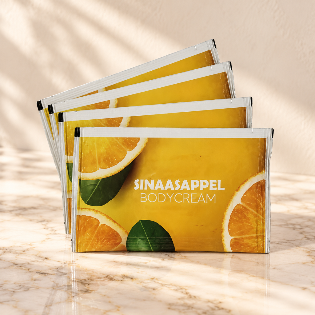 Treatments® - Crema Corporal de Naranja - 4 uds - Sachet 20 ml — presentación sobre mármol